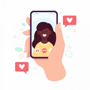 White background. In the center of the image is a hand holding a black phone. The person is calling iwth a woman with dark brown hair, wearing a yellow shirt. Around the phone are red square speech bubbles with white hearts in the center.